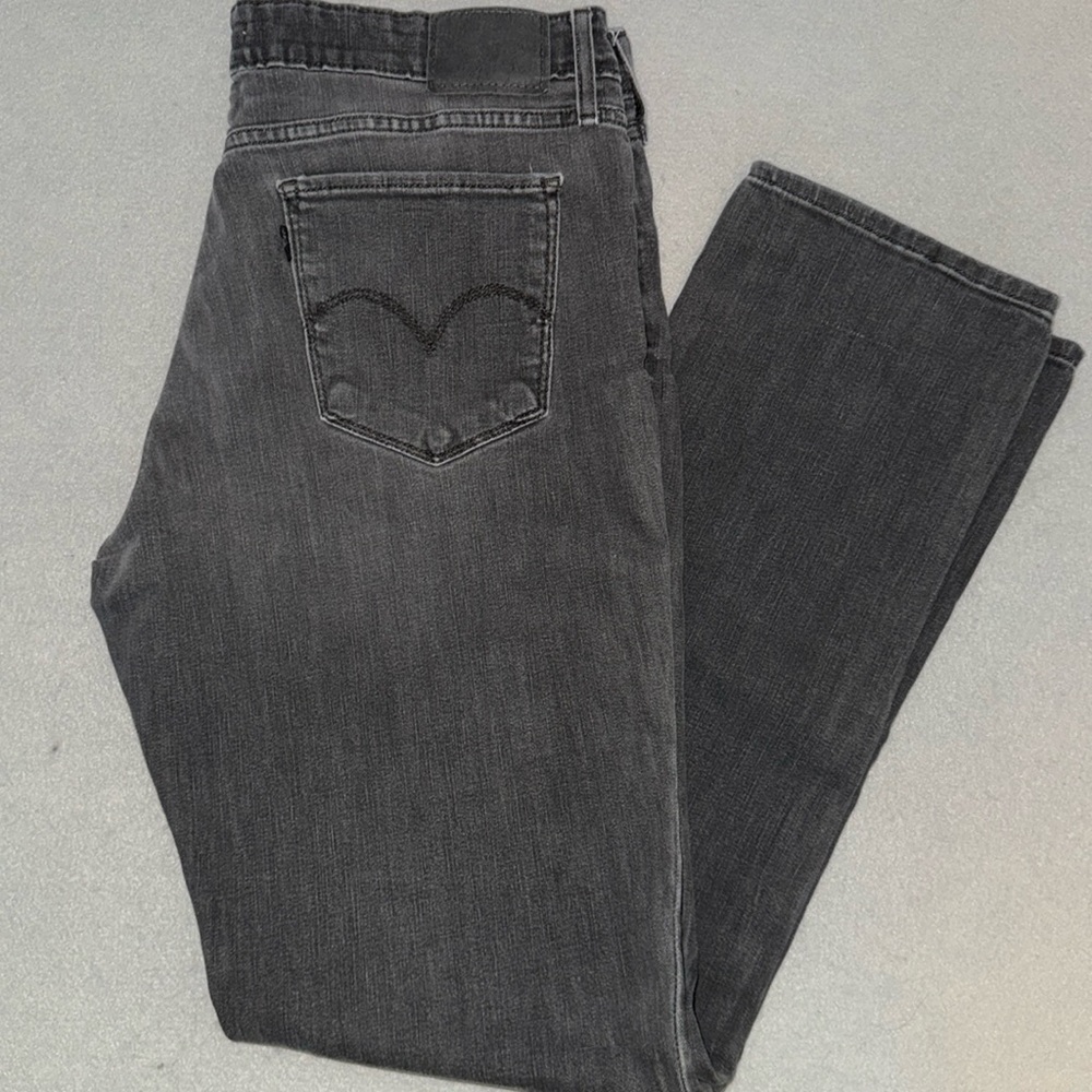 Levi’s 712 Slim Faded Black Jeans.